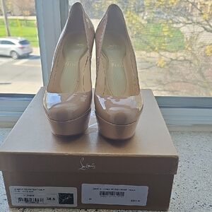 Elegant Nude Heels with Glossy Finish